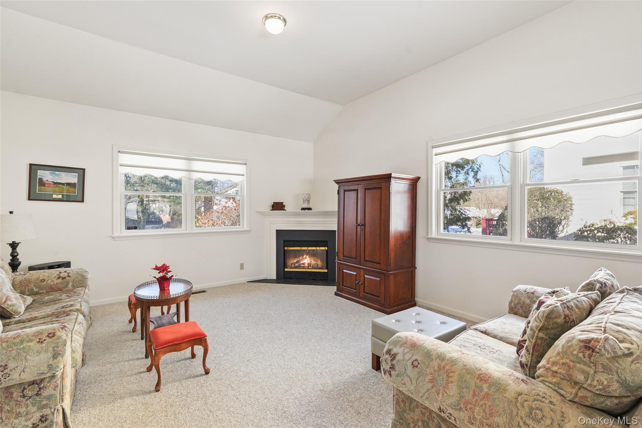 2 Churchill Road Rye Brook, NY 10573 - Photo 7 of 22 a bedroom with furniture and a window