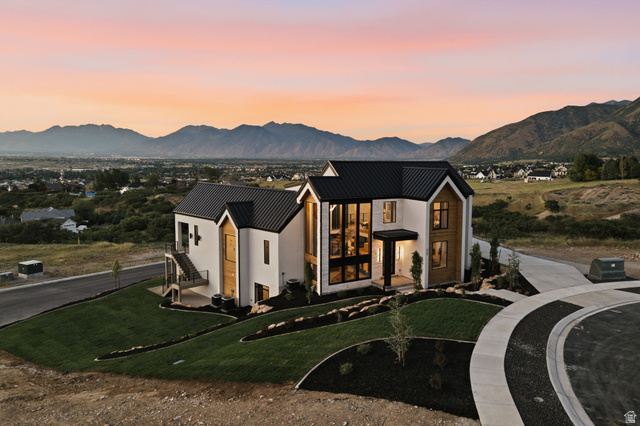 923 North Emery Lane Elk Ridge, UT 84651 - Photo 101 of 101 Contemporary architecture featuring a white exterior with wood-finish accents and a black metal roof