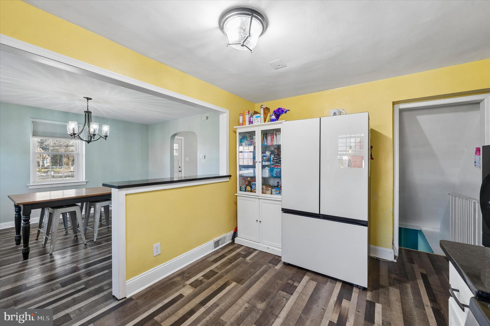114 Providence Road Morton, PA 19070 - Photo 13 of 25 a kitchen with a refrigerator and a stove top oven