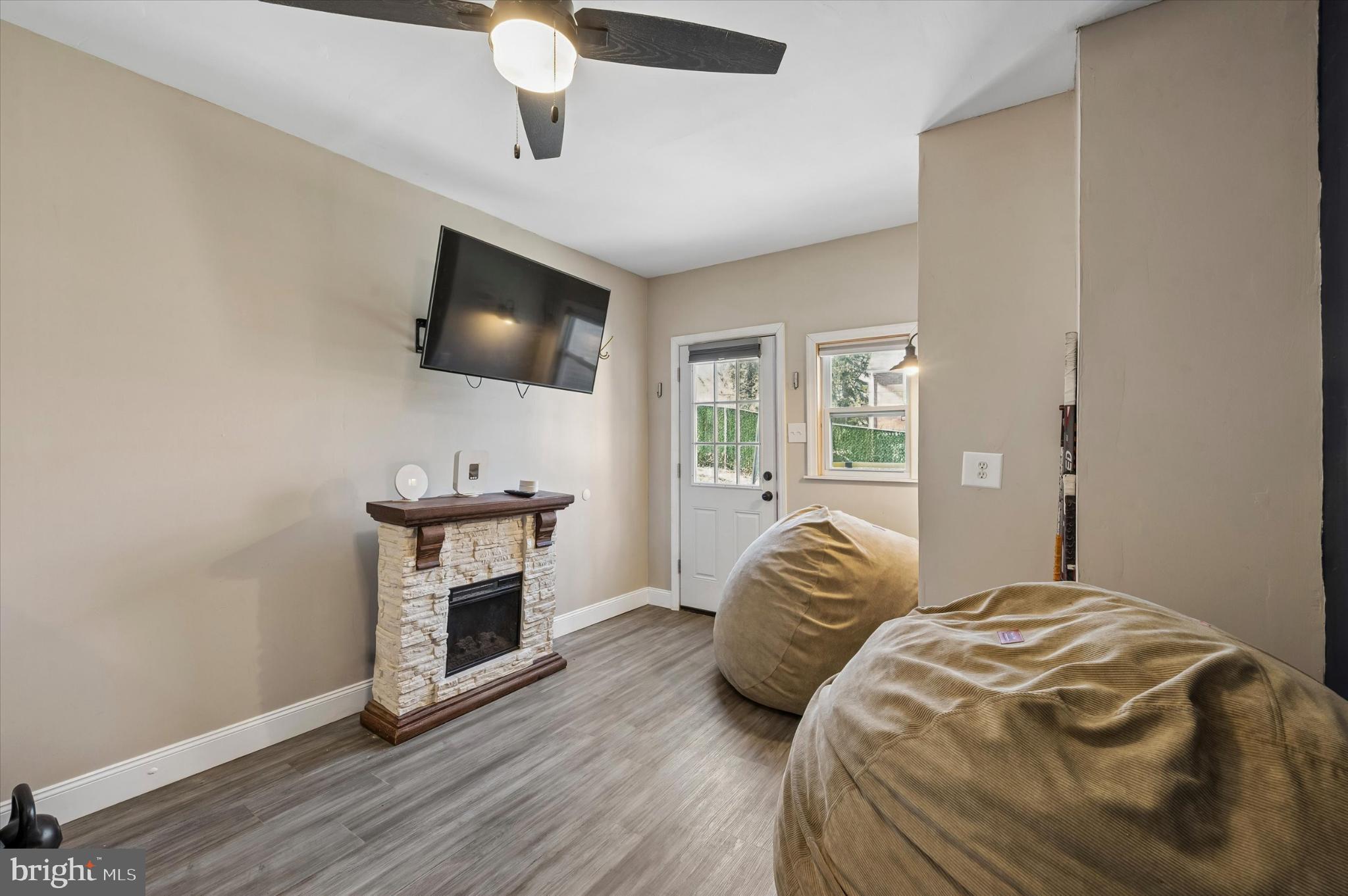 114 Providence Road Morton, PA 19070 - Photo 15 of 25 a bedroom with a bed and a flat screen tv