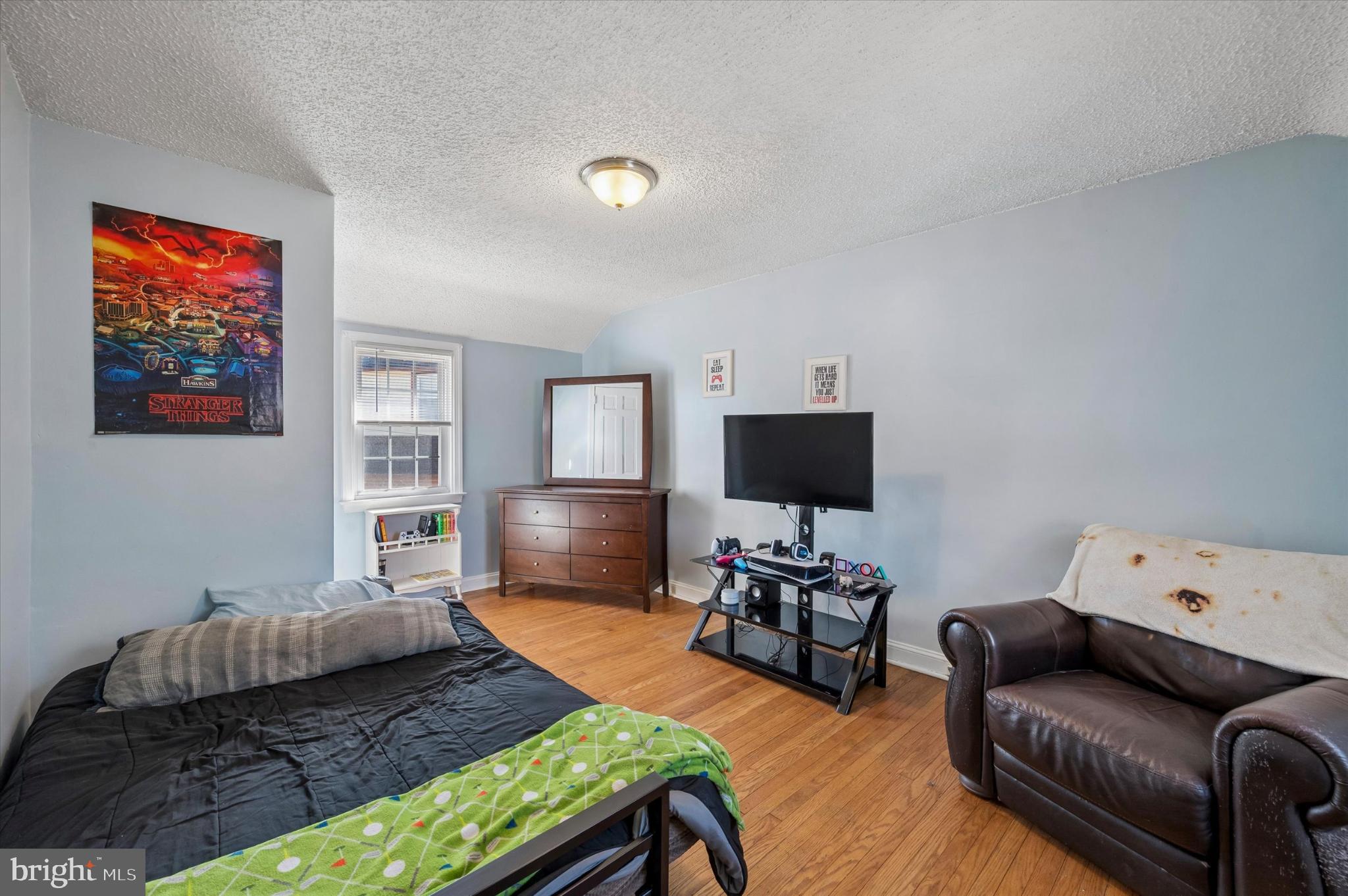 114 Providence Road Morton, PA 19070 - Photo 16 of 25 a living room with furniture and a flat screen tv