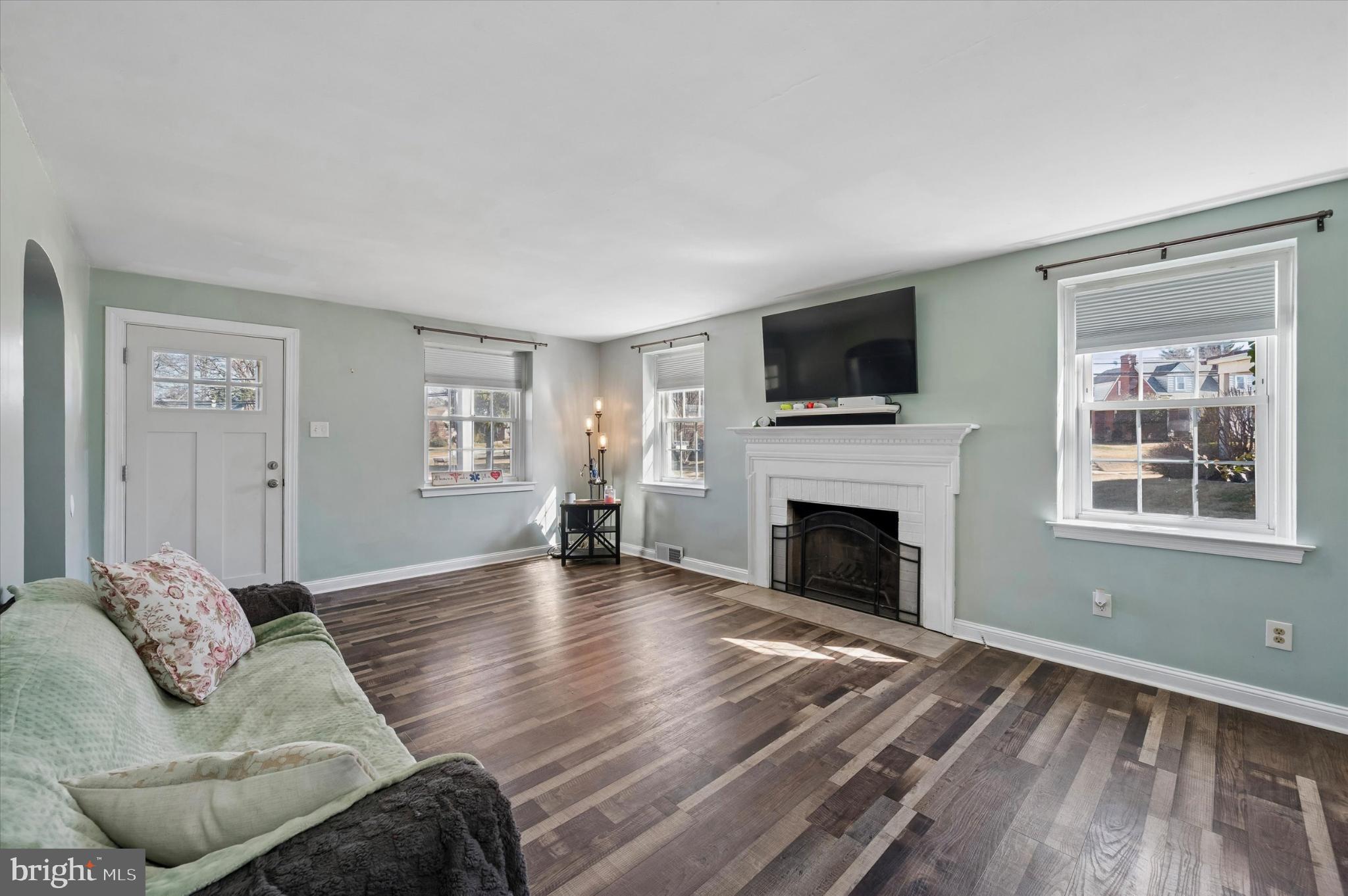114 Providence Road Morton, PA 19070 - Photo 5 of 25 a living room with furniture fireplace and flat screen tv