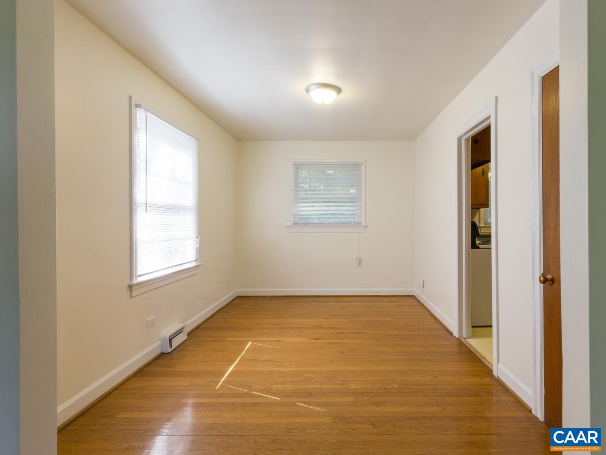 821 Cabell Avenue, Unit A&B Charlottesville, VA 22903 - Photo 11 of 27 an empty room with windows