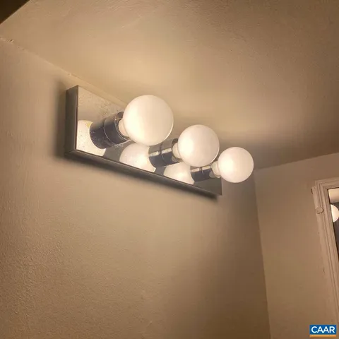 a close up of a wall with a sink