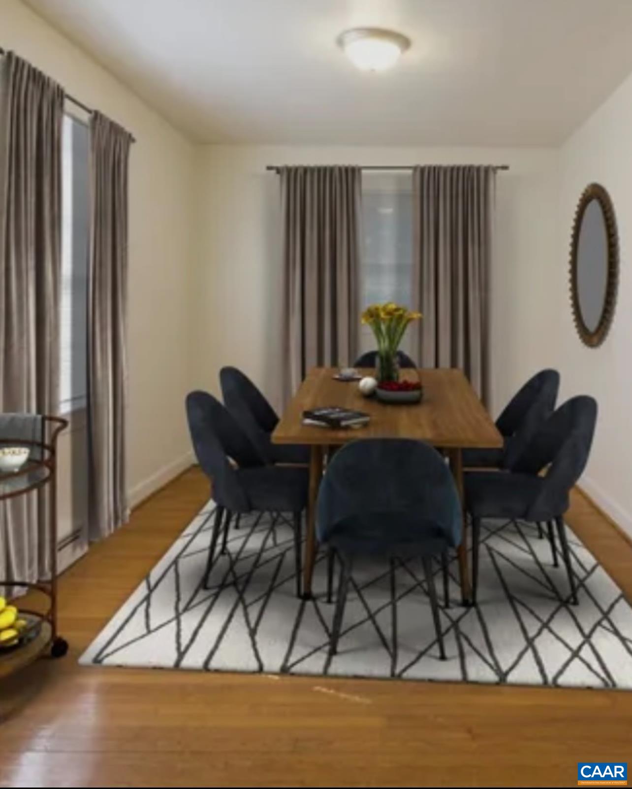 821 Cabell Avenue, Unit A&B Charlottesville, VA 22903 - Photo 24 of 27 a dining room with furniture and wooden floor