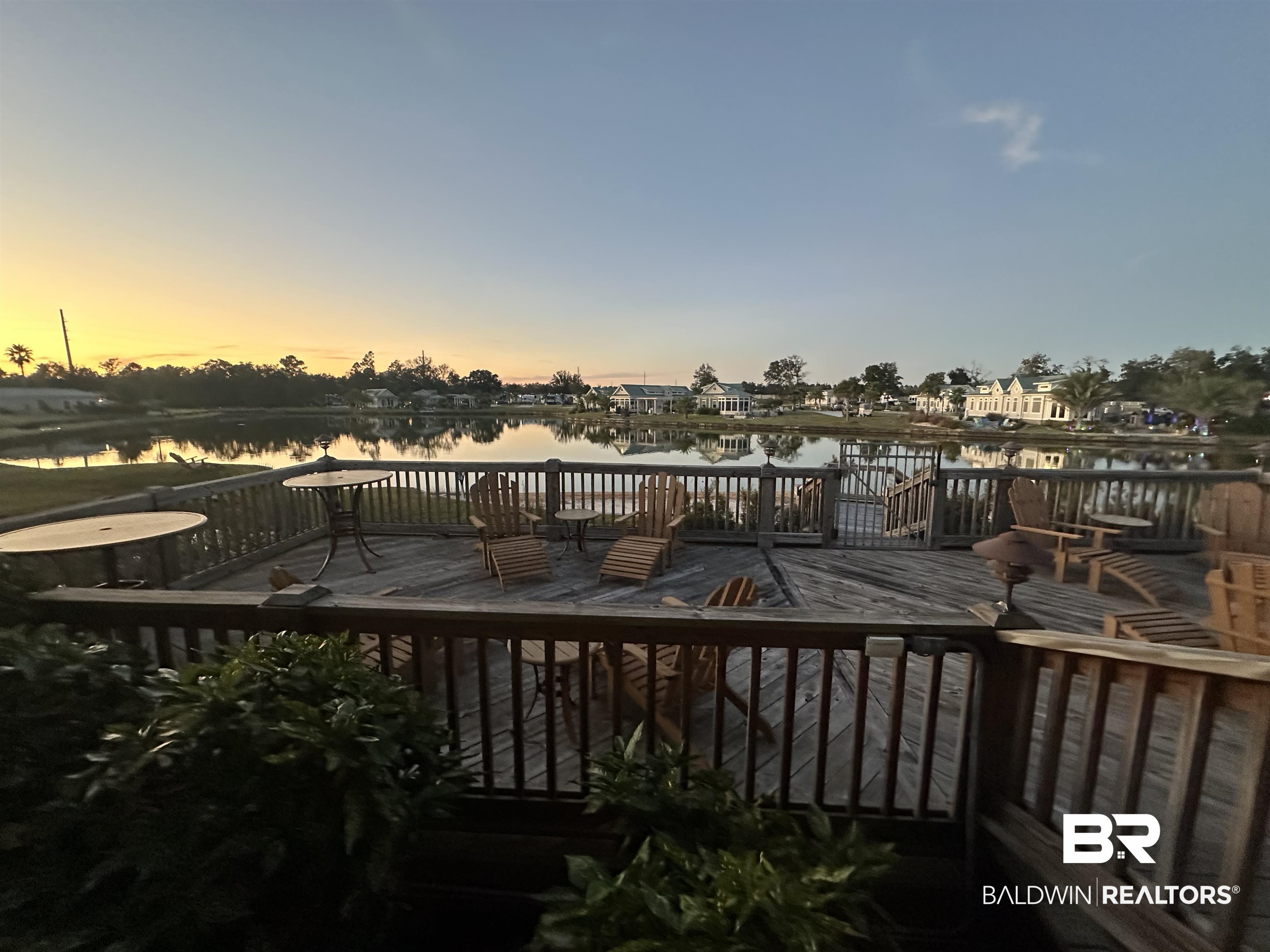 28114 Preserve Trail, Unit 190 Elberta, AL 36530 - Photo 67 of 69 Deck at dusk with a water view