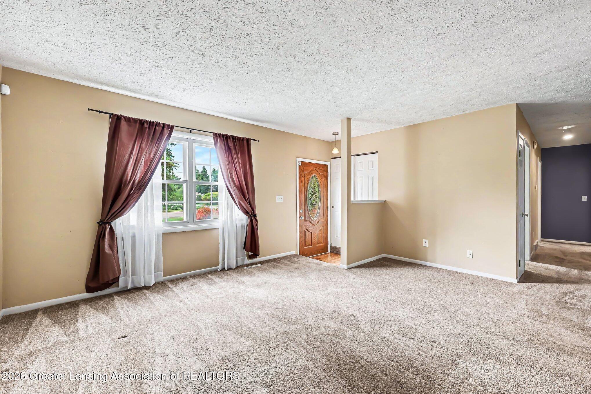 4670 Wilcox Road Holt, MI 48842 - Photo 5 of 29 005_cfhj5250_927