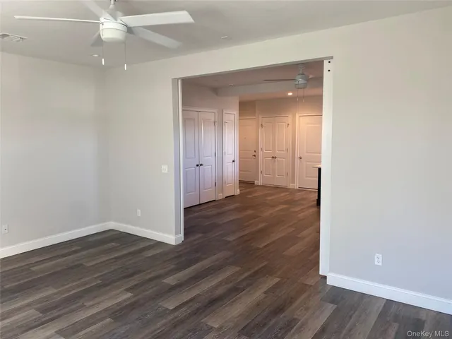a kitchen with stainless steel appliances granite countertop a stove and a refrigerator
