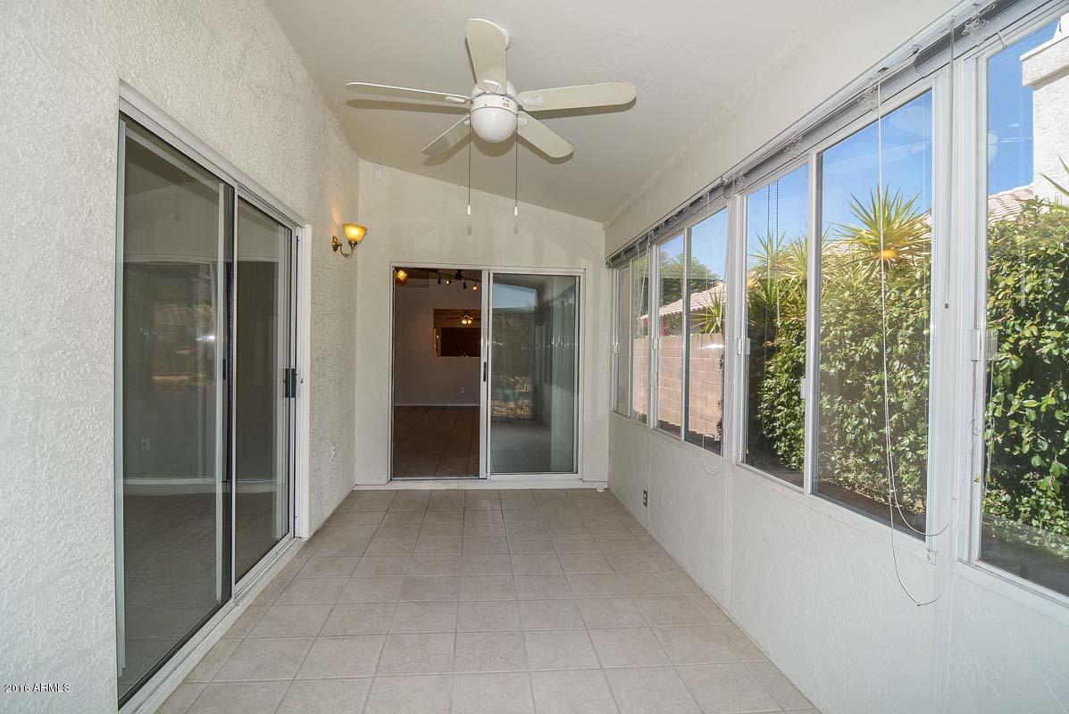 2836 East Wagoner Road Phoenix, AZ 85032 - Photo 21 of 26 Enclosed Patio with lots of Windows!