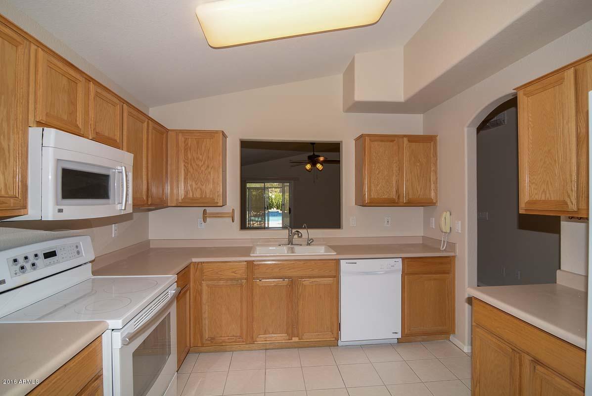 2836 East Wagoner Road Phoenix, AZ 85032 - Photo 9 of 26 Lots of Kitchen Cabinets!