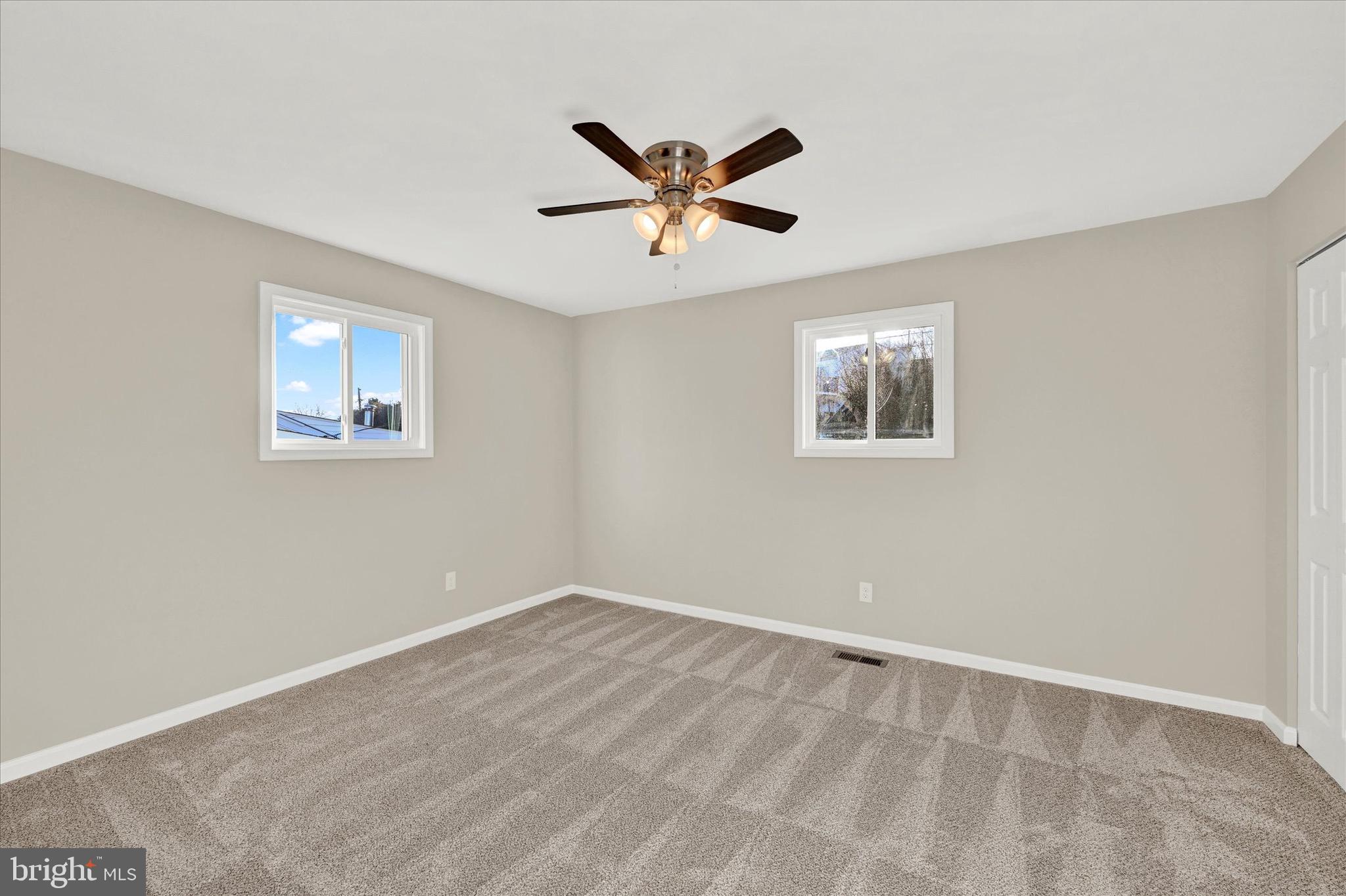 8117 Callo Lane Rosedale, MD 21237 - Photo 15 of 23 a view of empty room with window