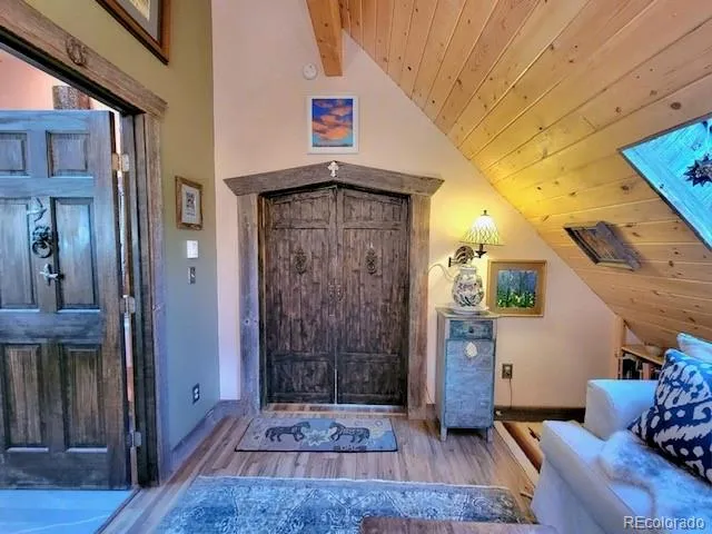 a view of an entryway with a hardwood