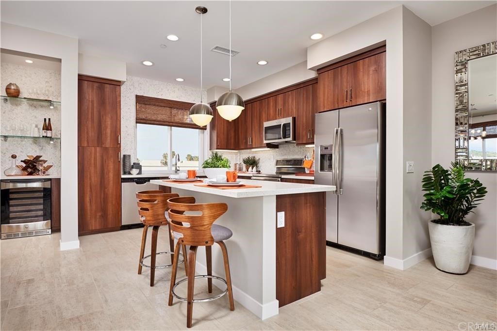 315 Mission Road Montebello, CA 90640 - Photo 1 of 1 a kitchen with stainless steel appliances granite countertop a refrigerator a sink a stove and a refrigerator