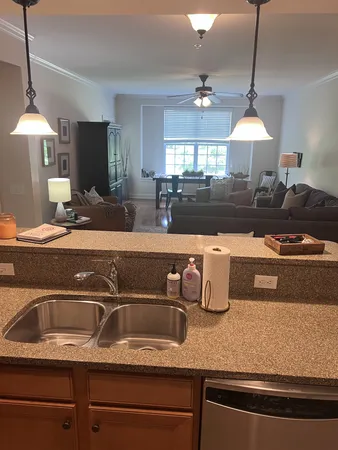 a kitchen with a sink and a stove