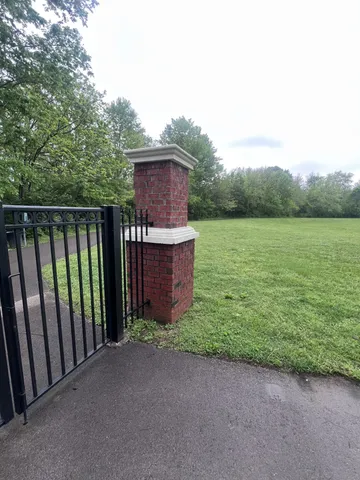 a view of a terrace with yard