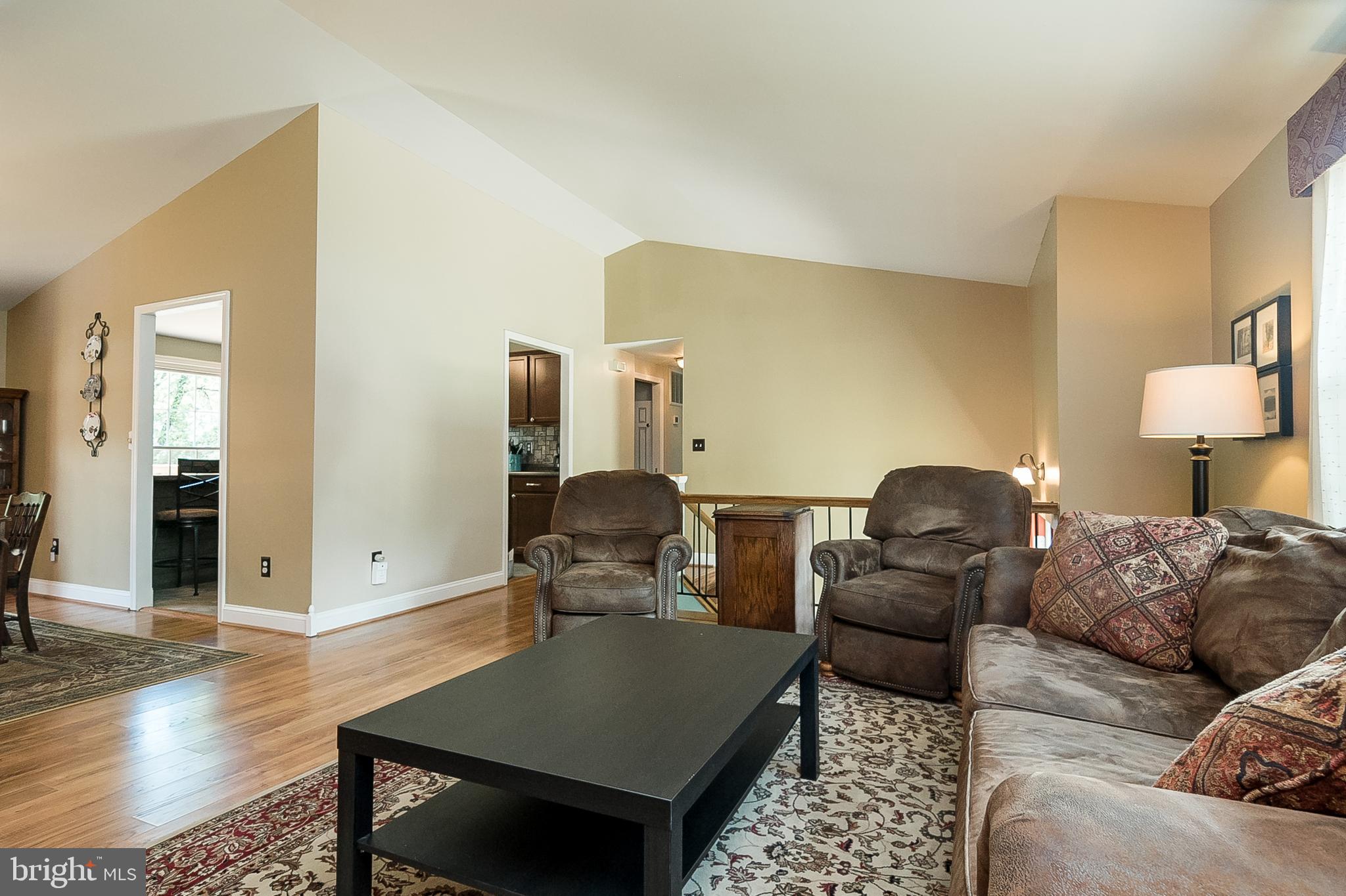 8315 Risha Drive Severn, MD 21144 - Photo 15 of 43 Living Room with adjacent Dining Area