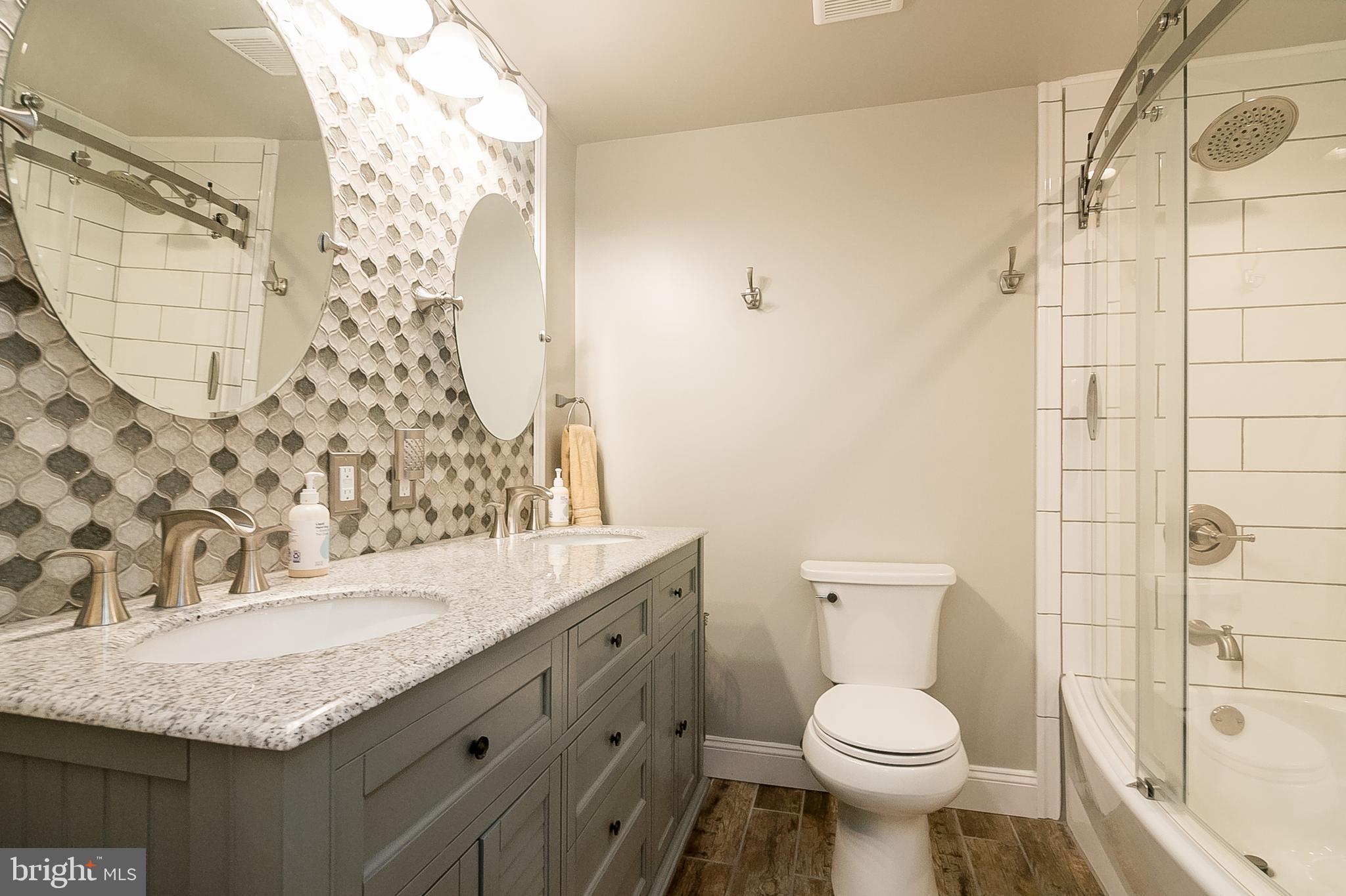 8315 Risha Drive Severn, MD 21144 - Photo 27 of 43 Beautiful custom bath w/subway tile