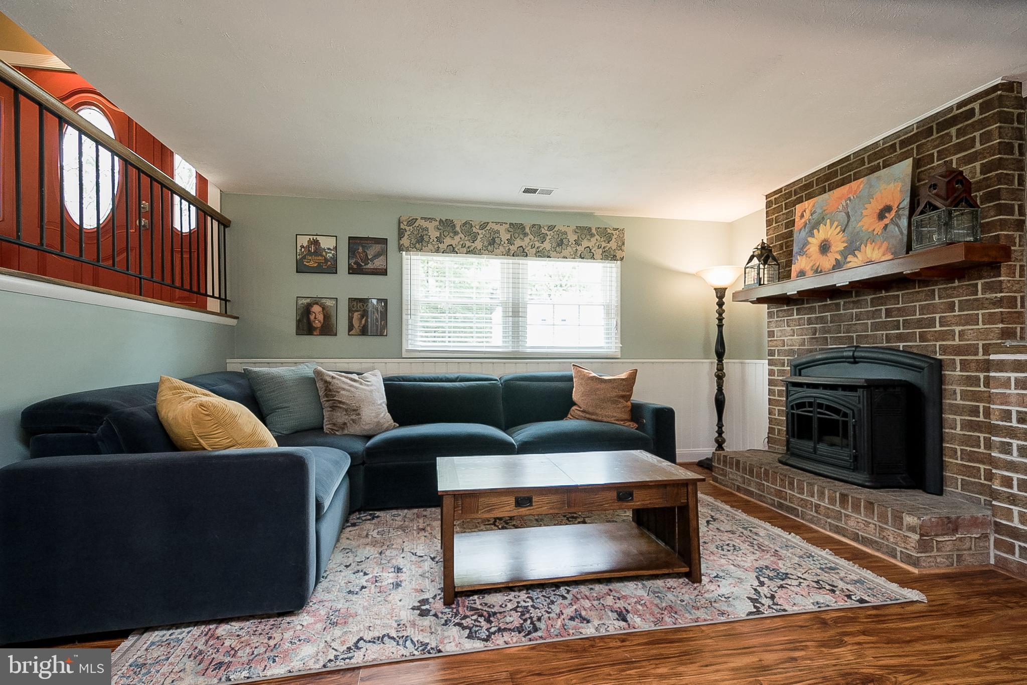 8315 Risha Drive Severn, MD 21144 - Photo 33 of 43 Fmaily Room w/new pellet stove