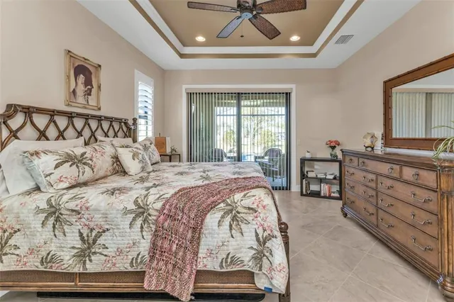 a view of walk in closet with clothes