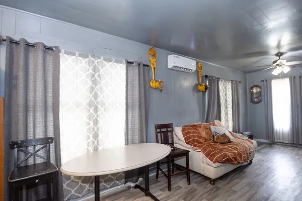 a living room with furniture and a table