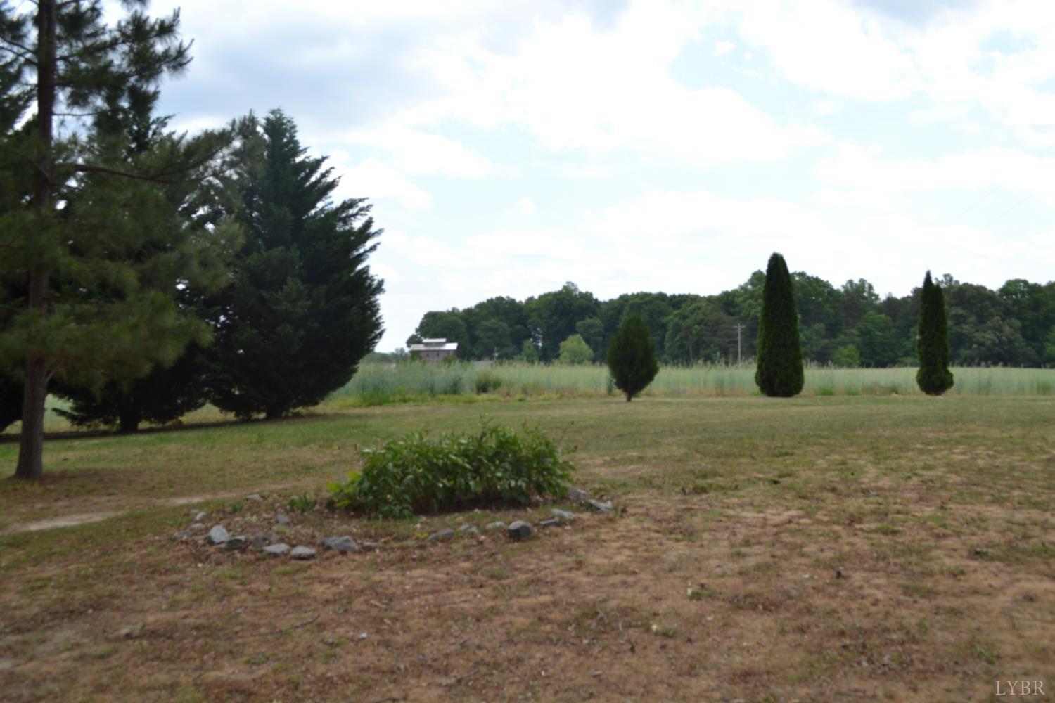 6387 Red House Road Rustburg, VA 24588 - Photo 35 of 38 a view of outdoor space with deck and yard