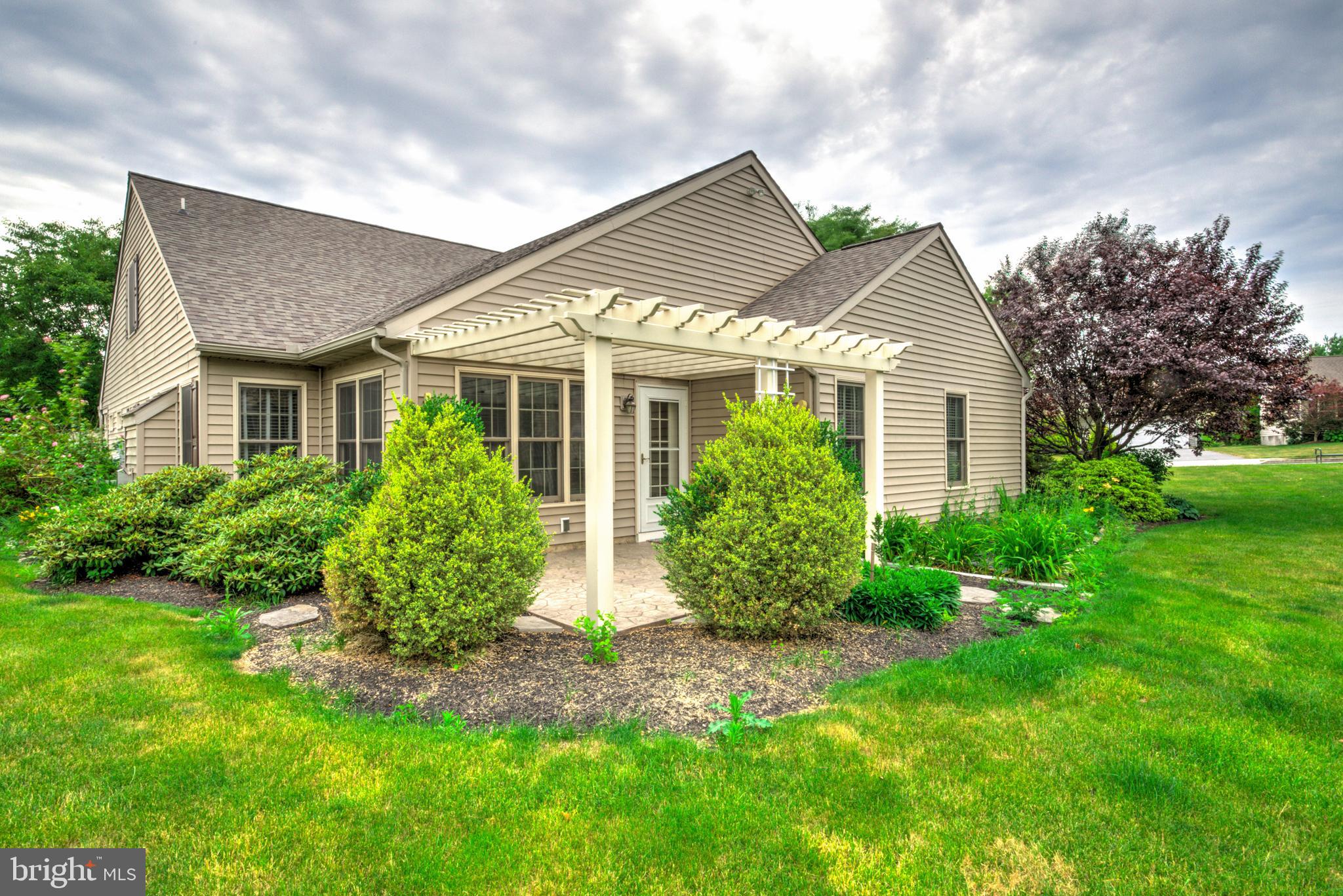 749 Heather Ridge Manheim, PA 17545 - Photo 41 of 57 Charming Patio with Lush Greenery