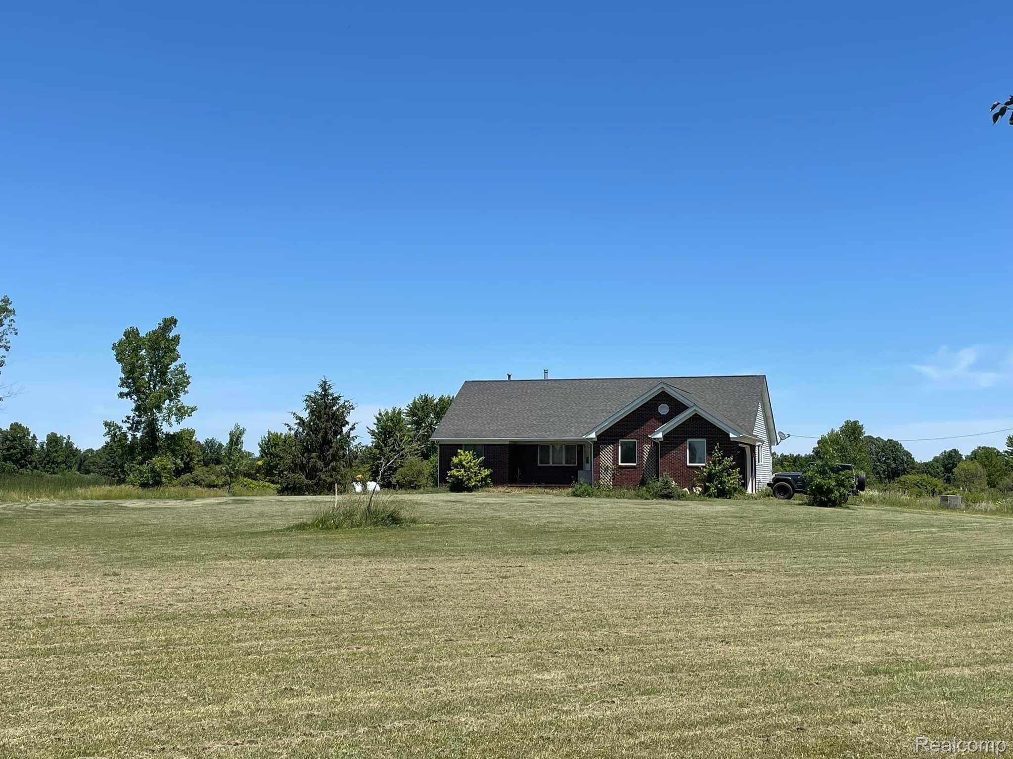 11976 Dunn Road Memphis, MI 48041 - Photo 1 of 13 Front of Home