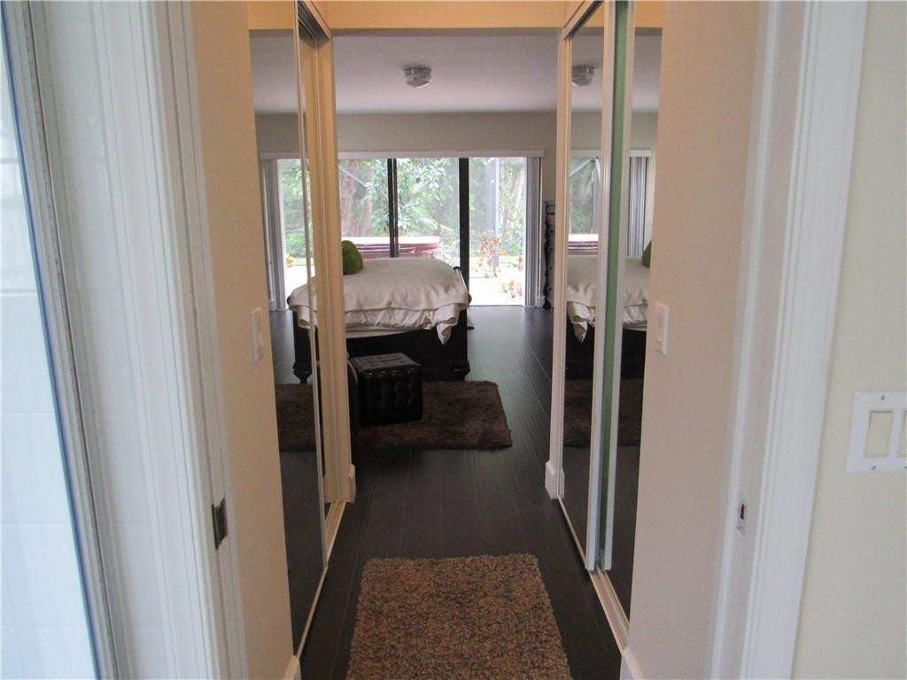 3381 Overlook Road Davie, FL 33328 - Photo 17 of 34 MASTER SUITE HALLWAY/WALK IN CLOSETS