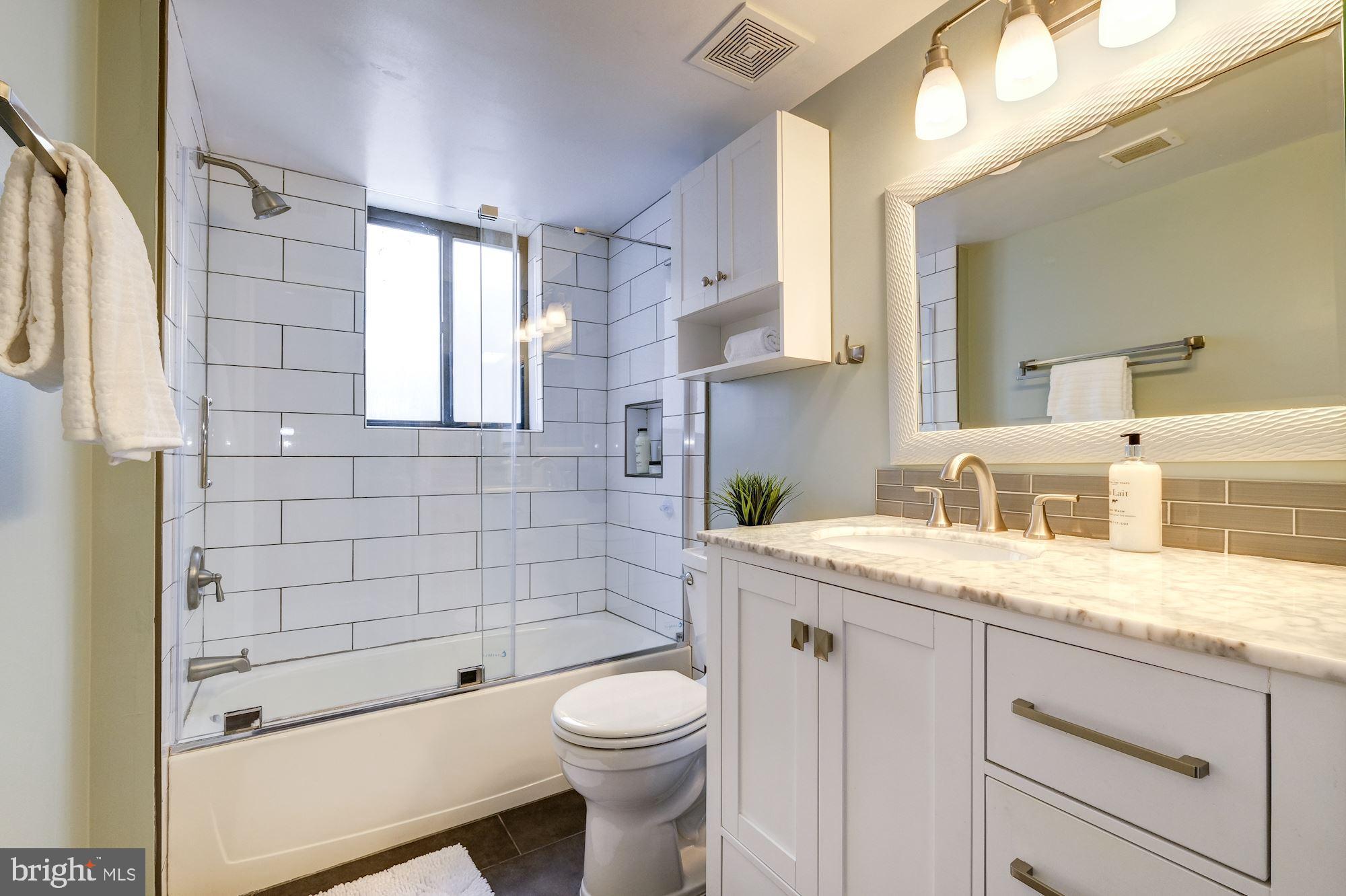 1225 13th Street Northwest, Unit 307 Washington, DC 20005 - Photo 10 of 17 Updated Bathroom