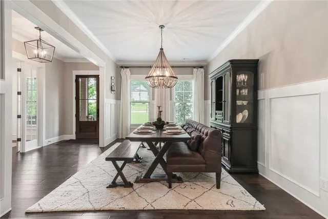 a view of walk in closet with clothes
