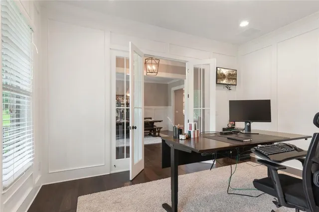 a bedroom with a bed and a walk in closet