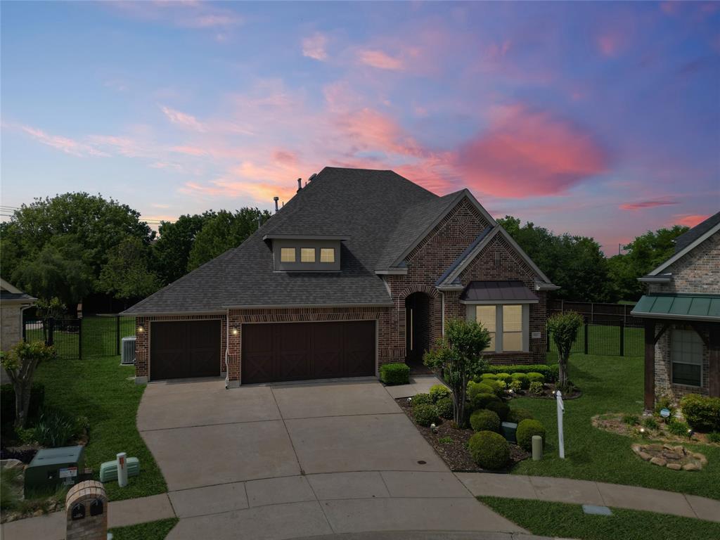 401 Varnum Way Fairview, TX 75069 - Photo 32 of 33 a front view of a house with a garden