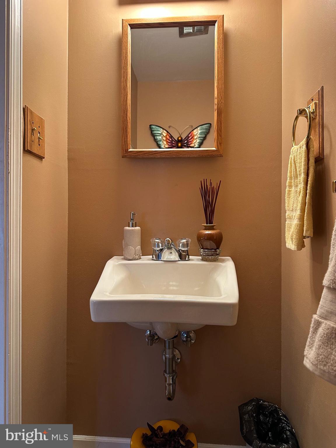 320 West Orvilla Road Hatfield, PA 19440 - Photo 19 of 46 a bathroom with a sink and mirror