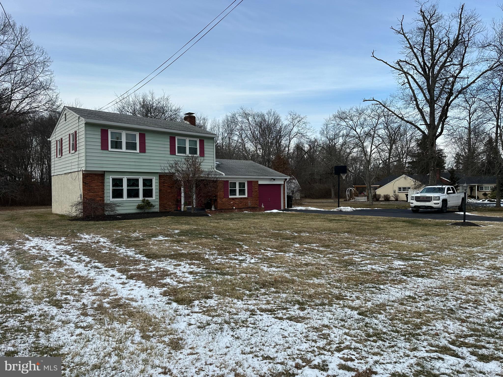 320 West Orvilla Road Hatfield, PA 19440 - Photo 2 of 46 a front view of a house with a yard
