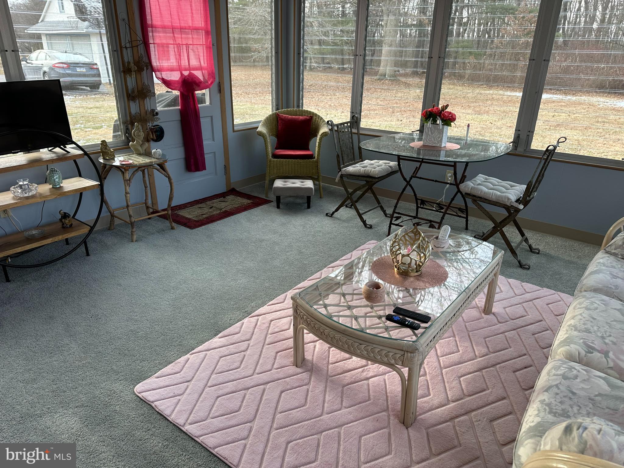 320 West Orvilla Road Hatfield, PA 19440 - Photo 21 of 46 a living room with furniture and floor to ceiling windows