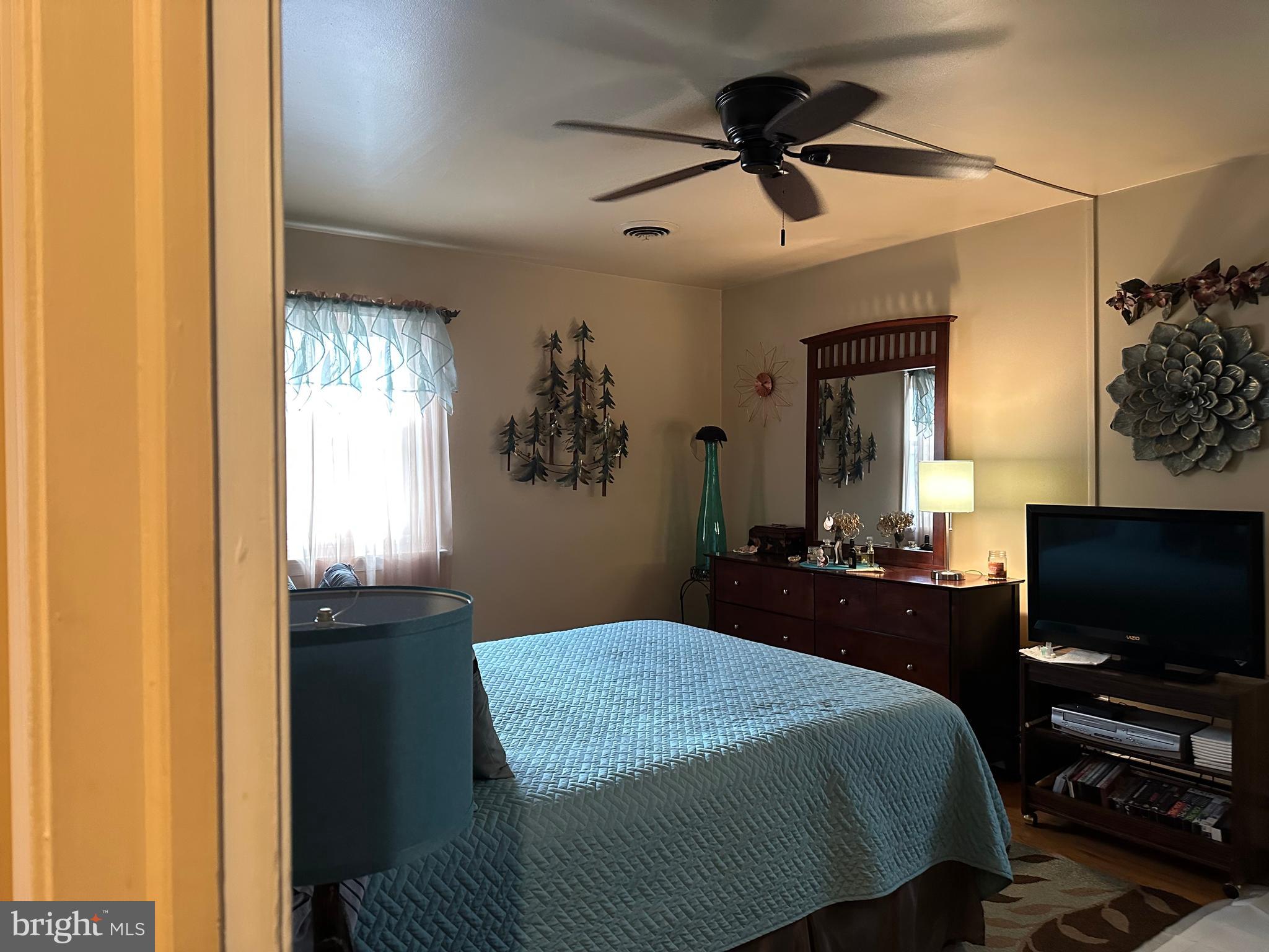320 West Orvilla Road Hatfield, PA 19440 - Photo 25 of 46 a bedroom with a bed and a flat screen tv