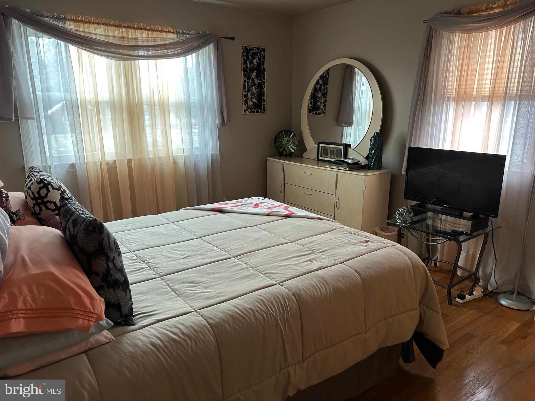 320 West Orvilla Road Hatfield, PA 19440 - Photo 30 of 46 a bedroom with a bed and a flat screen tv