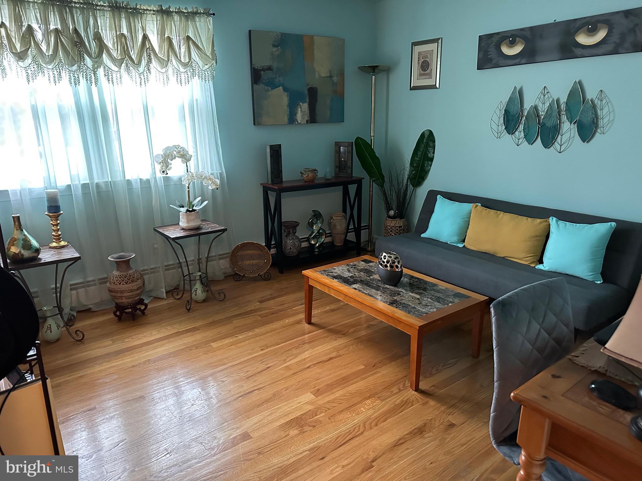320 West Orvilla Road Hatfield, PA 19440 - Photo 32 of 46 a living room with furniture and a table