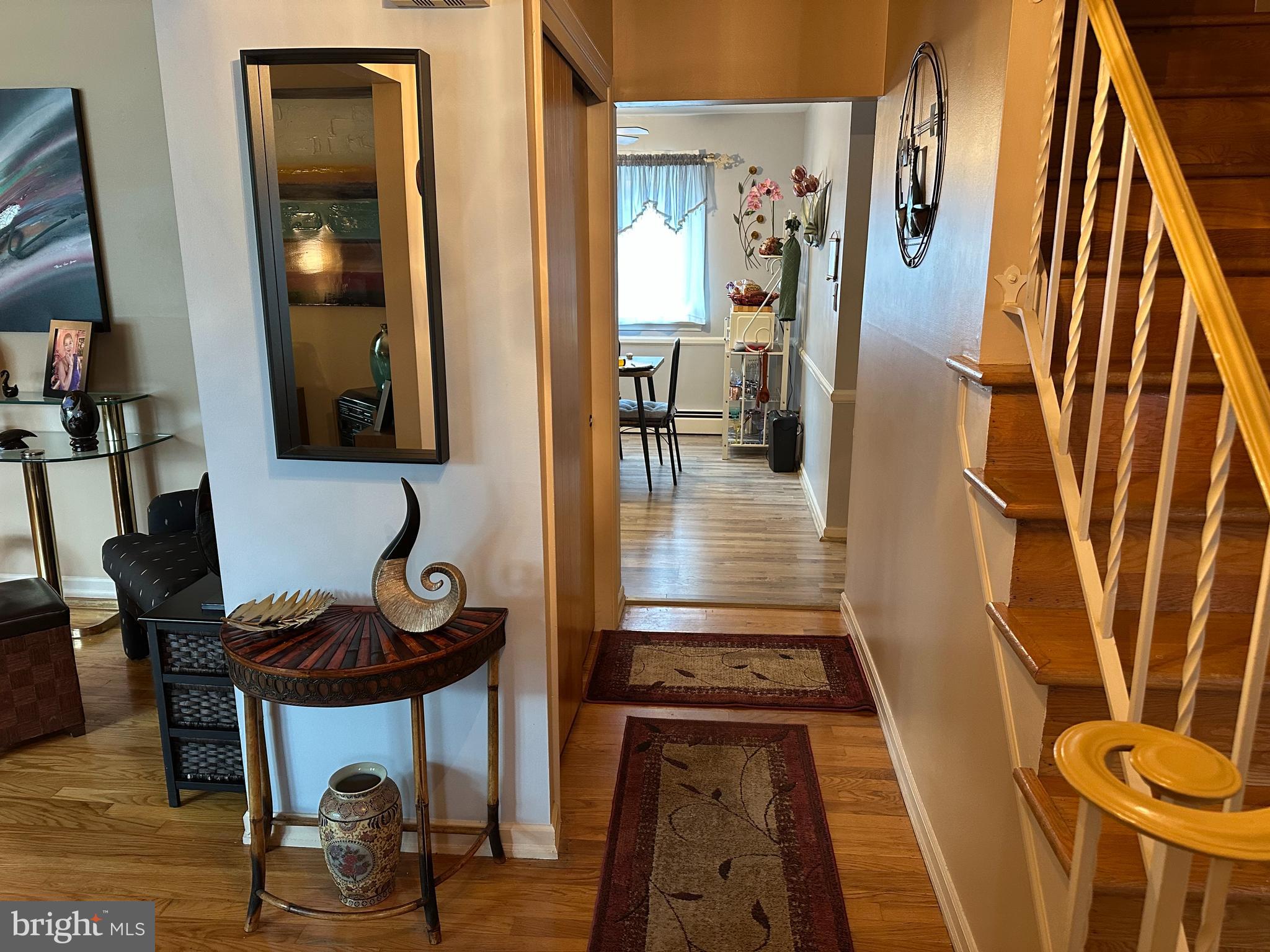 320 West Orvilla Road Hatfield, PA 19440 - Photo 4 of 46 a view of a hallway with furniture and front view of a workspace