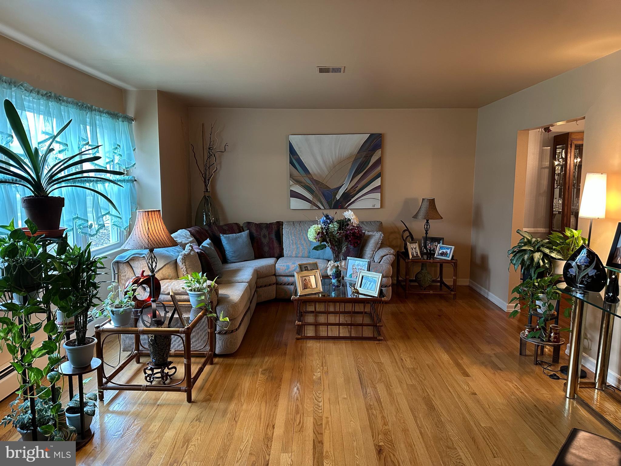 320 West Orvilla Road Hatfield, PA 19440 - Photo 5 of 46 a living room filled with furniture and wooden floor