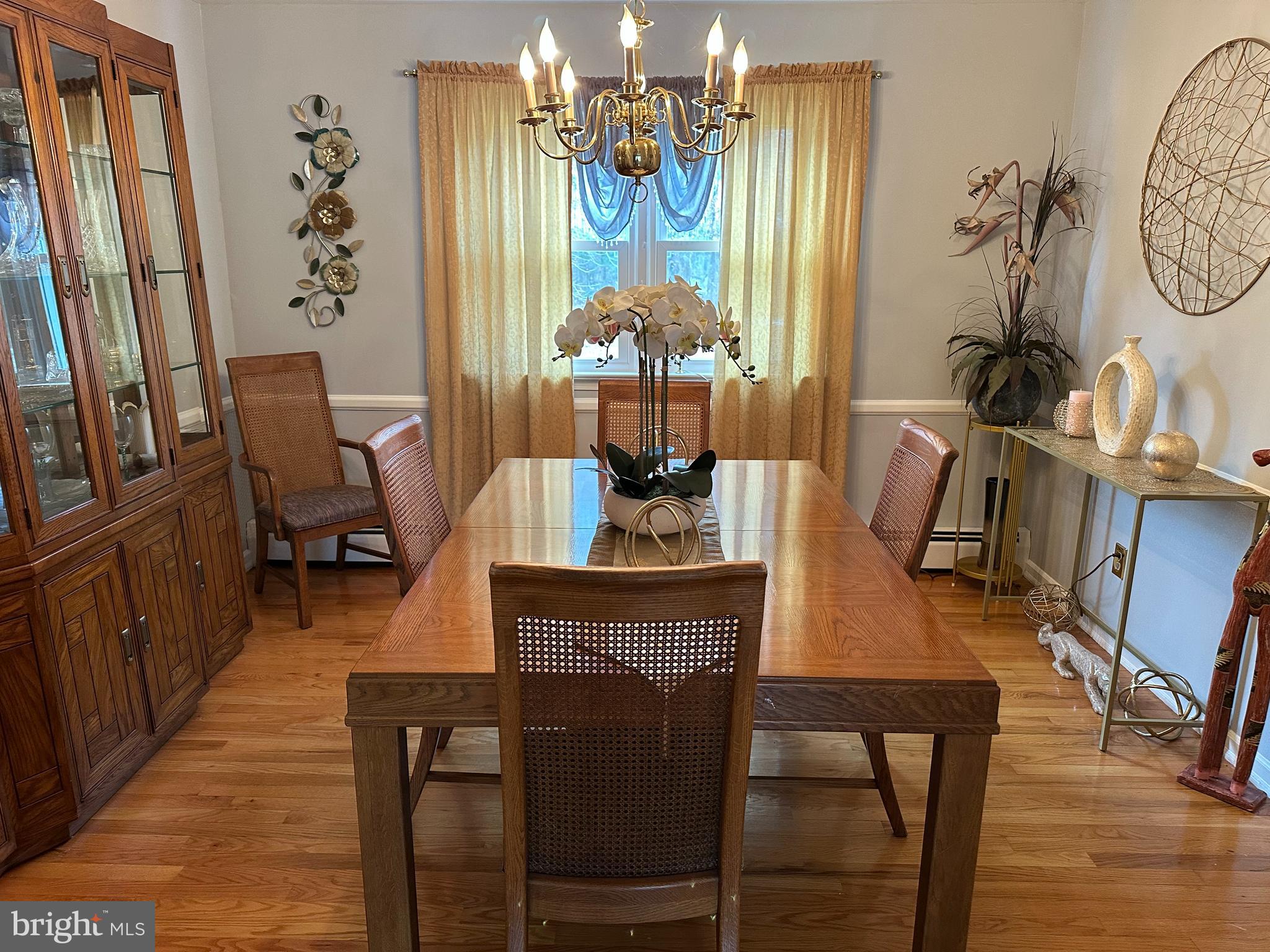320 West Orvilla Road Hatfield, PA 19440 - Photo 8 of 46 a view of a dining room with furniture window and wooden floor