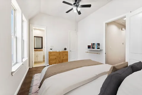 a view of room with window and wooden floor