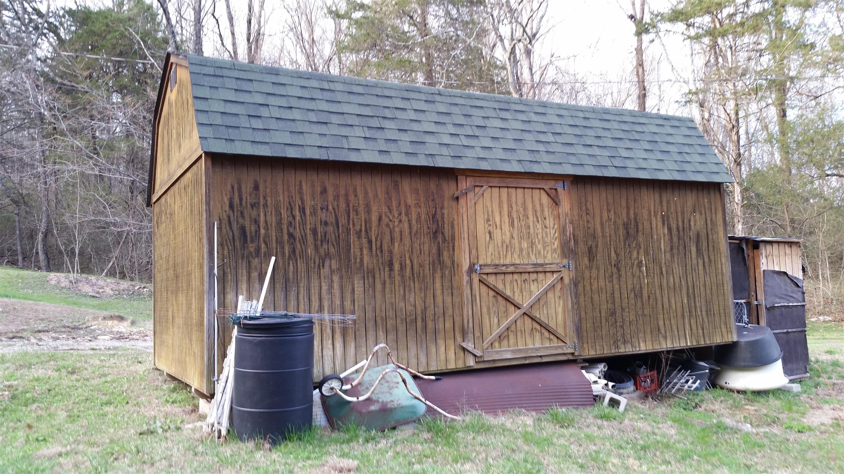 277 Hiwassee Road Lebanon, TN 37087 - Photo 4 of 15 a view of backyard with wooden fence and a bench