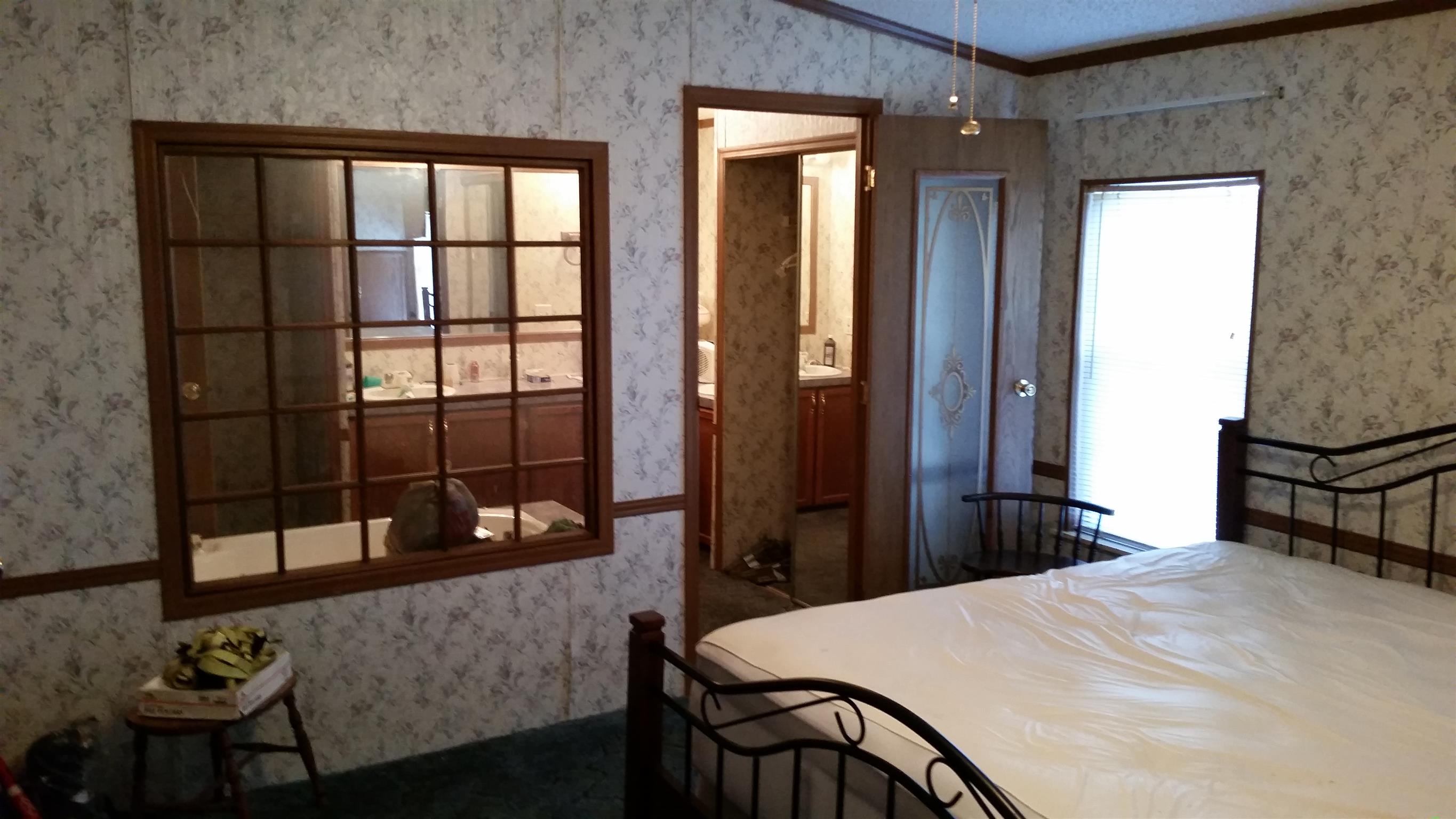 277 Hiwassee Road Lebanon, TN 37087 - Photo 10 of 15 a bedroom with a bed and a window