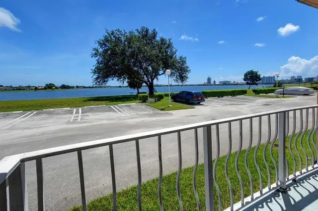 a view of swimming pool from a balcony