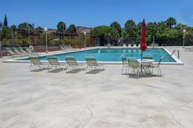 a view of a chairs and table in the terrace