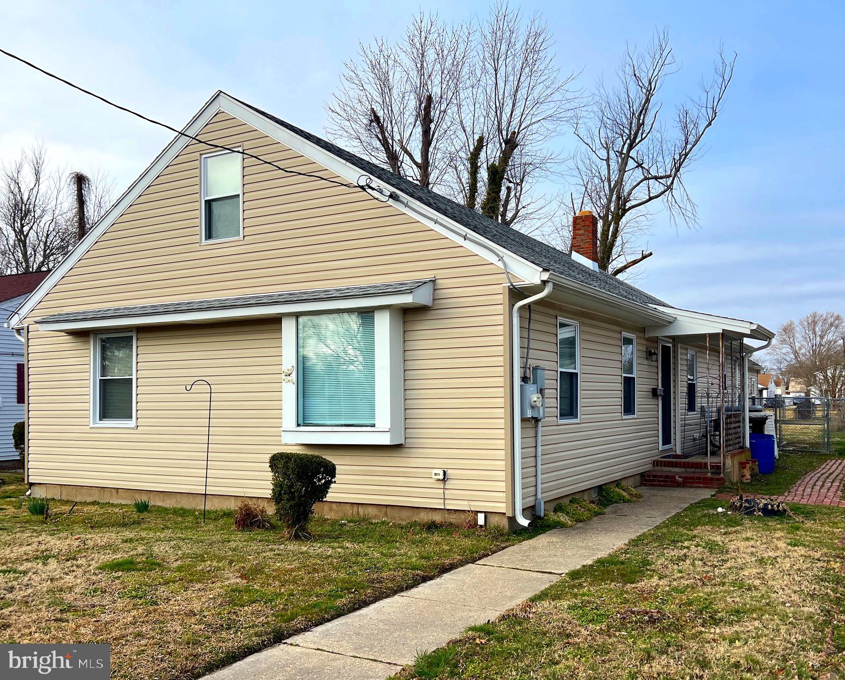 315 Shepherd Avenue Cambridge, MD 21613 - Photo 1 of 21 a front view of a house with garden