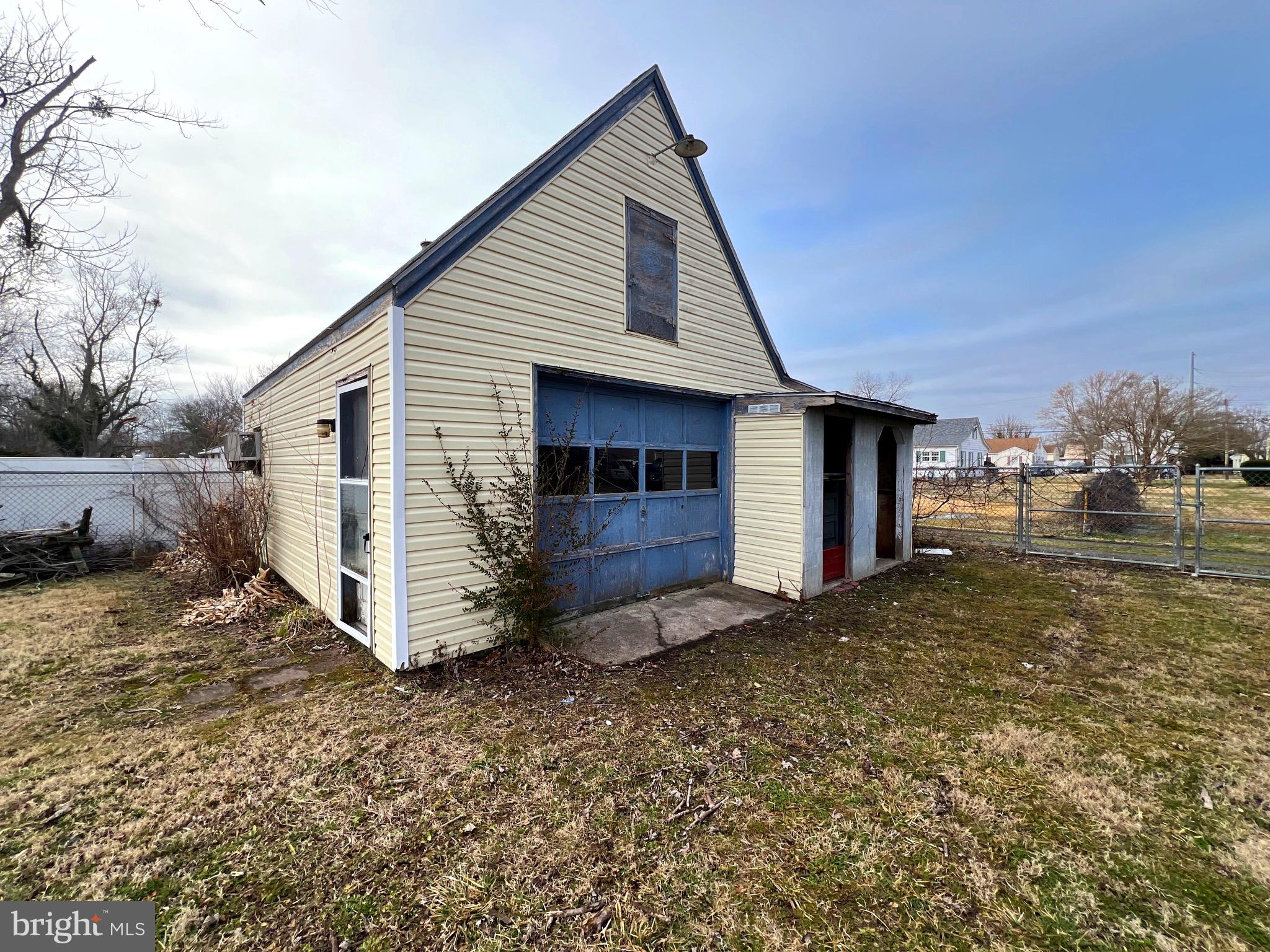 315 Shepherd Avenue Cambridge, MD 21613 - Photo 17 of 21 a view of a house with a yard
