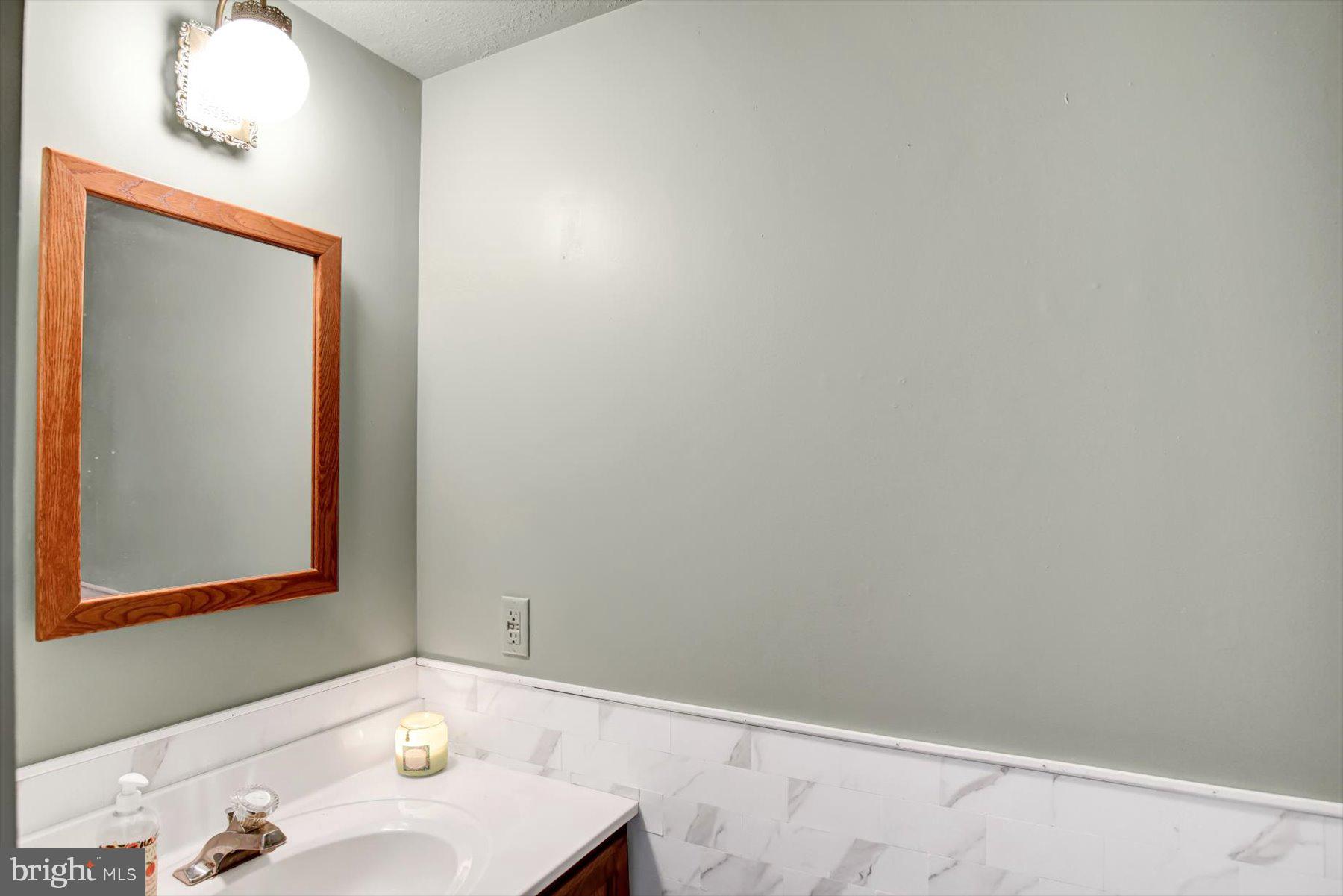 6 James Street Mill Hall, PA 17751 - Photo 14 of 39 a bathroom with a sink and a mirror