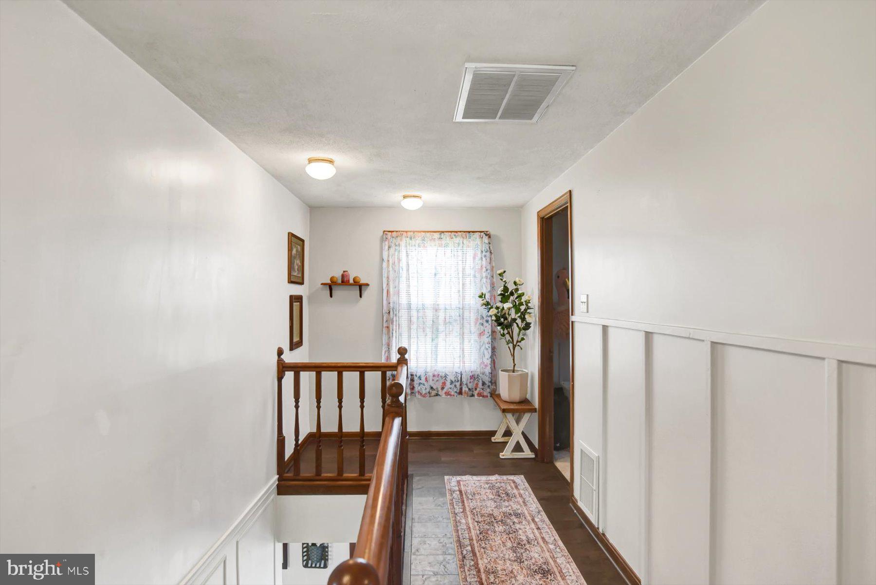 6 James Street Mill Hall, PA 17751 - Photo 16 of 39 a view of a hallway with wooden chairs